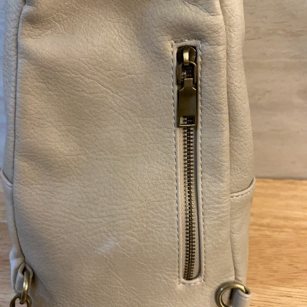 Urban Expressions Liberty leather sling bag with a chevron pattern strap. - Picture 7 of 16